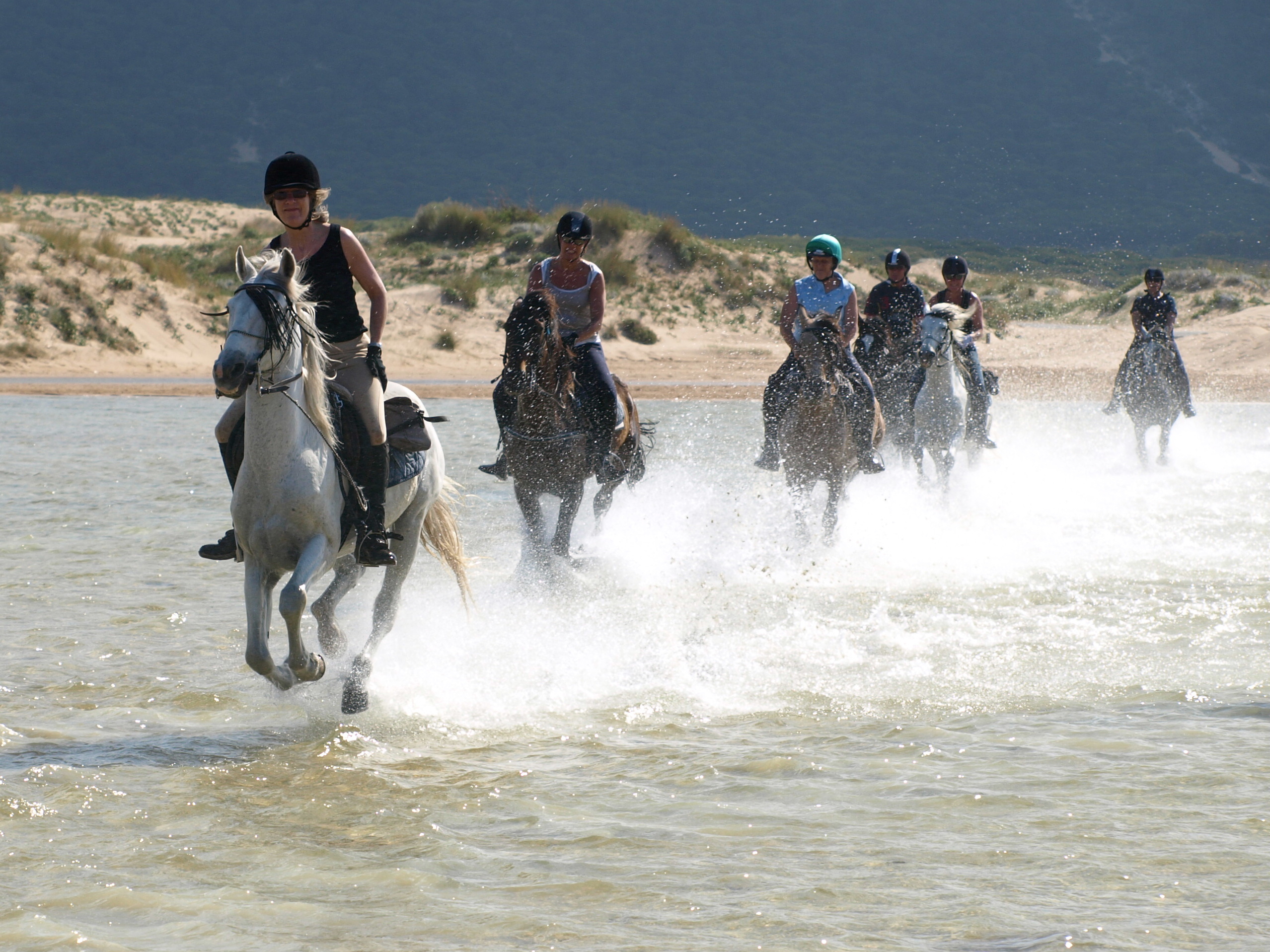 Paardrijden op het strand in Zuid Spanje - Vakantie te paard / Reisbureau Perlan