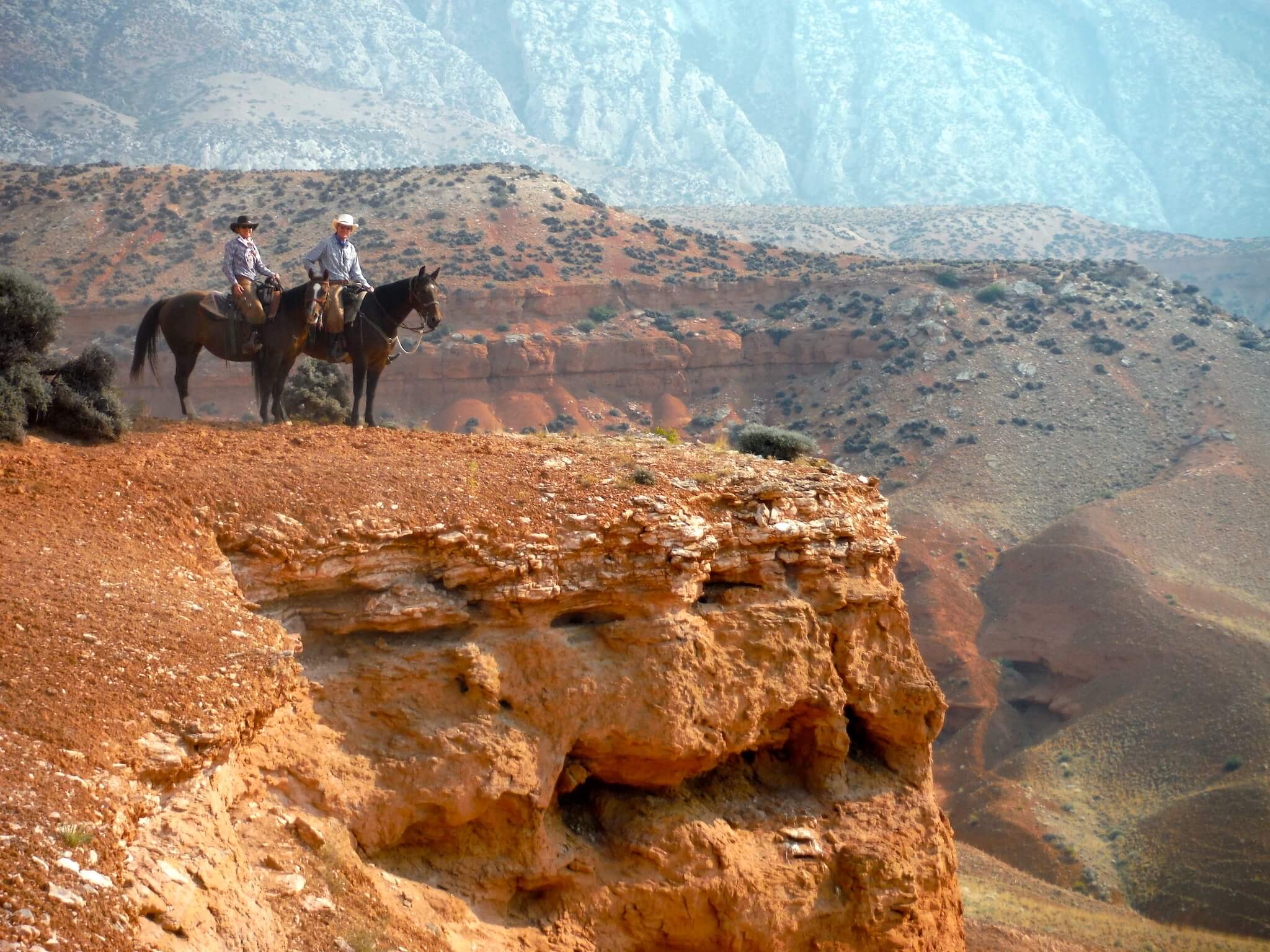 paard en ruiters op ranch vakantie in Wyoming